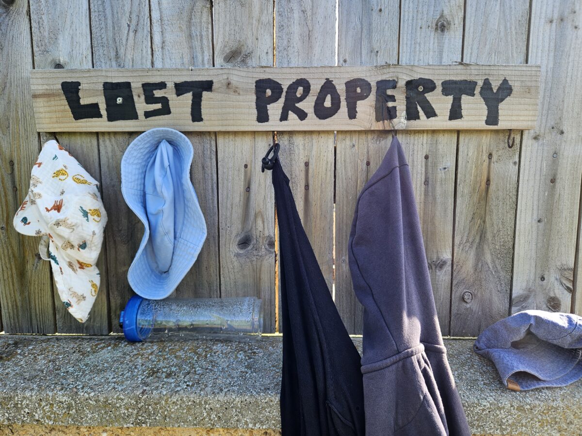 Wetsuit hanger showcasing Hopeman coastal charm.